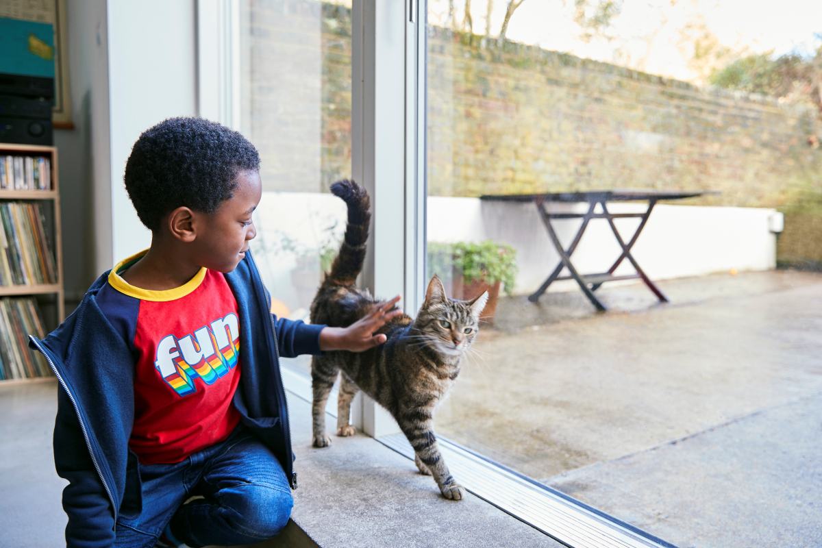 A child wearing a red 