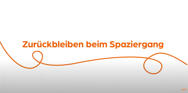 Text „Zurückbleiben beim Spaziergang“ mit orangefarbener Spirale auf weißem Hintergrund.