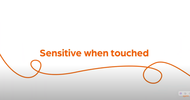 Text "Sensitive when touched" with orange swirl on white background.